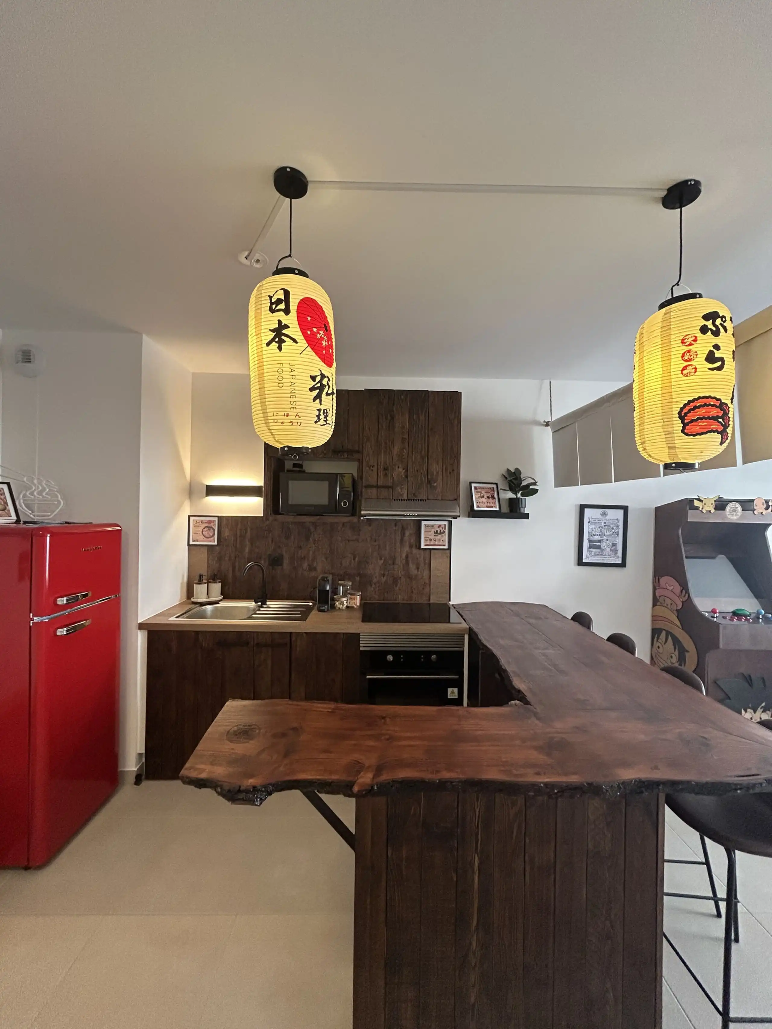 The fitted kitchen at Nakama House with its made-to-measure solid wood worktop — photo 6