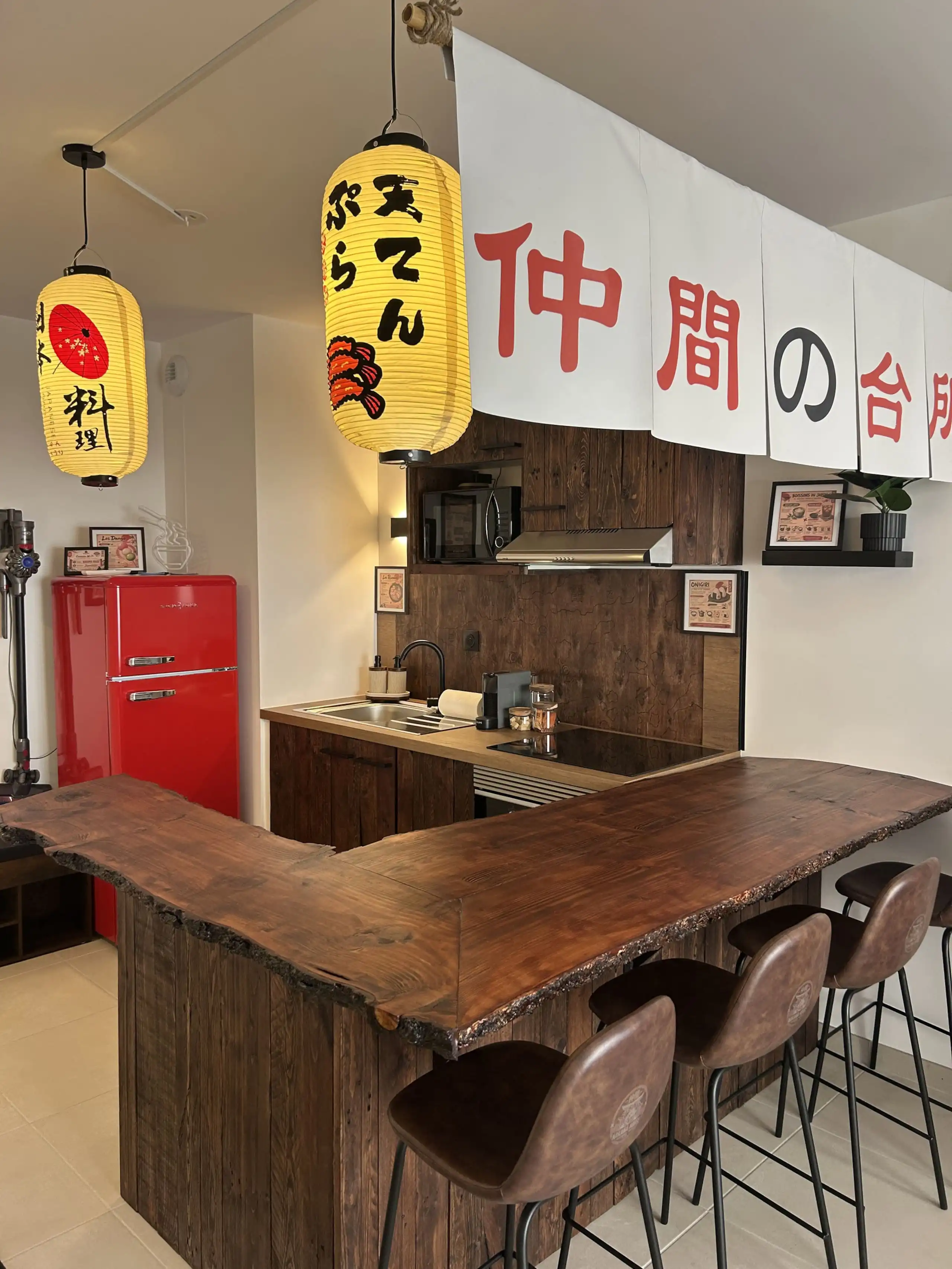 The fitted kitchen at Nakama House with its made-to-measure solid wood worktop — photo 7